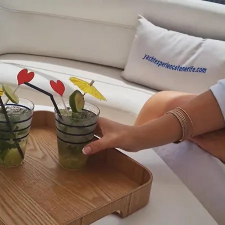Yacht Experience Tenerife 24h Tour With Private Skipper & Private Hostess With Cocktails, Sandwiches, Free Minibar And Free Islandwide Pick-up And Return In A Tesla S Sportscar ספינת מלון *
