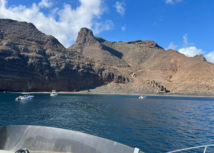 Yacht Experience Tenerife 24h Tour With Private Skipper & Private Hostess With Cocktails, Sandwiches, Free Minibar And Free Islandwide Pick-up And Return In A Tesla S Sportscar Ботель