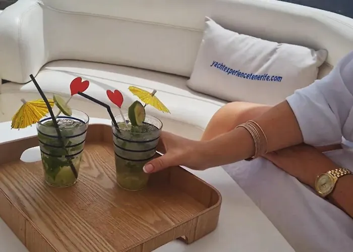 Yacht Experience Tenerife 24h Tour With Private Skipper & Private Hostess With Cocktails, Sandwiches, Free Minibar And Free Islandwide Pick-up And Return In A Tesla S Sportscar Ботель *