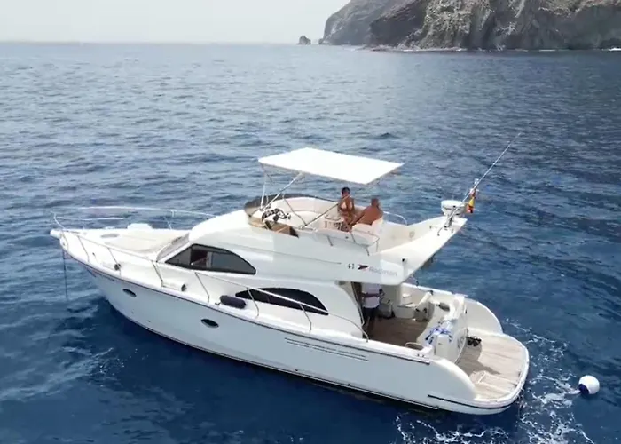 Yacht Experience Tenerife 24h Tour With Private Skipper & Private Hostess With Cocktails, Sandwiches, Free Minibar And Free Islandwide Pick-up And Return In A Tesla S Sportscar Ботель *