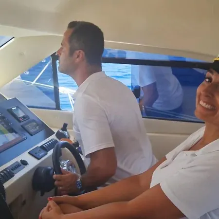 Botel Yacht Experience Tenerife 24h Tour With Private Skipper & Private Hostess With Cocktails, Sandwiches, Free Minibar And Free Islandwide Pick-up And Return In A Tesla S Sportscar *